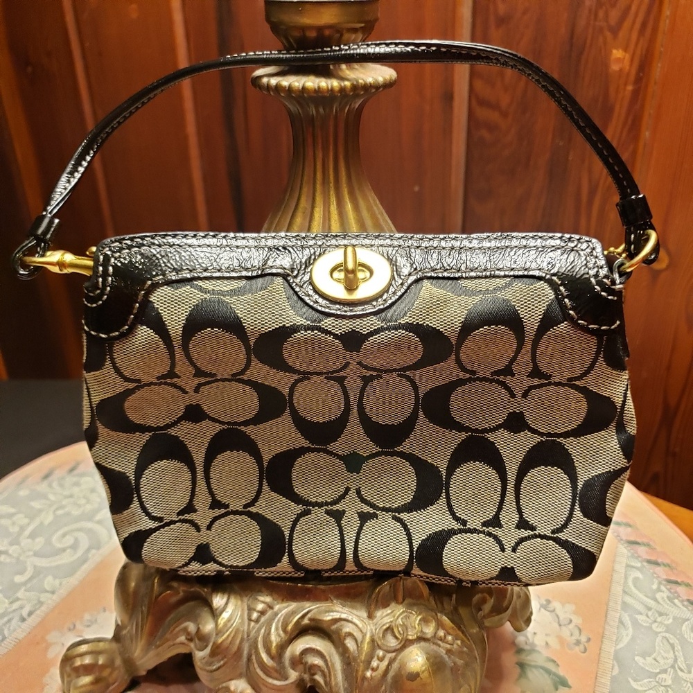 Coach turnlock wristlet